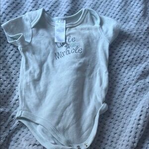 White Short-Sleeved Bodysuit with Snap Fasteners